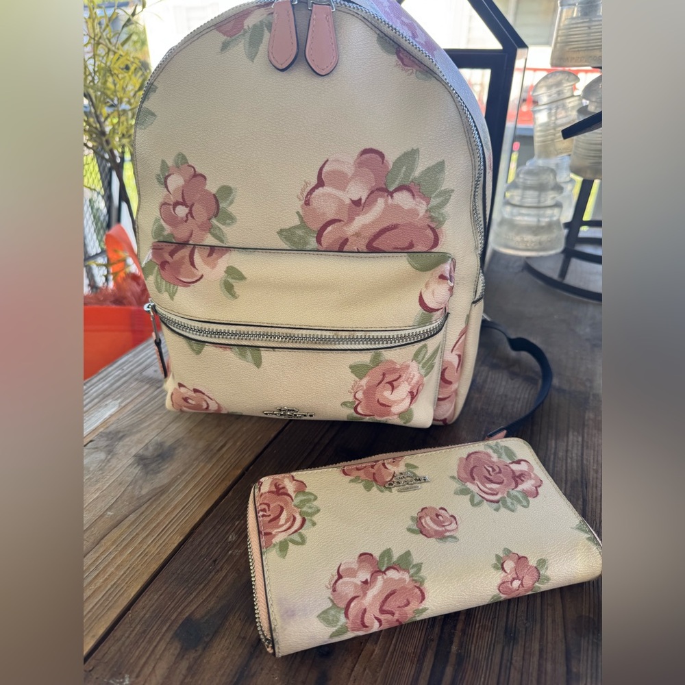 Floral Coach backpack medium size and matching Coach zip around wallet